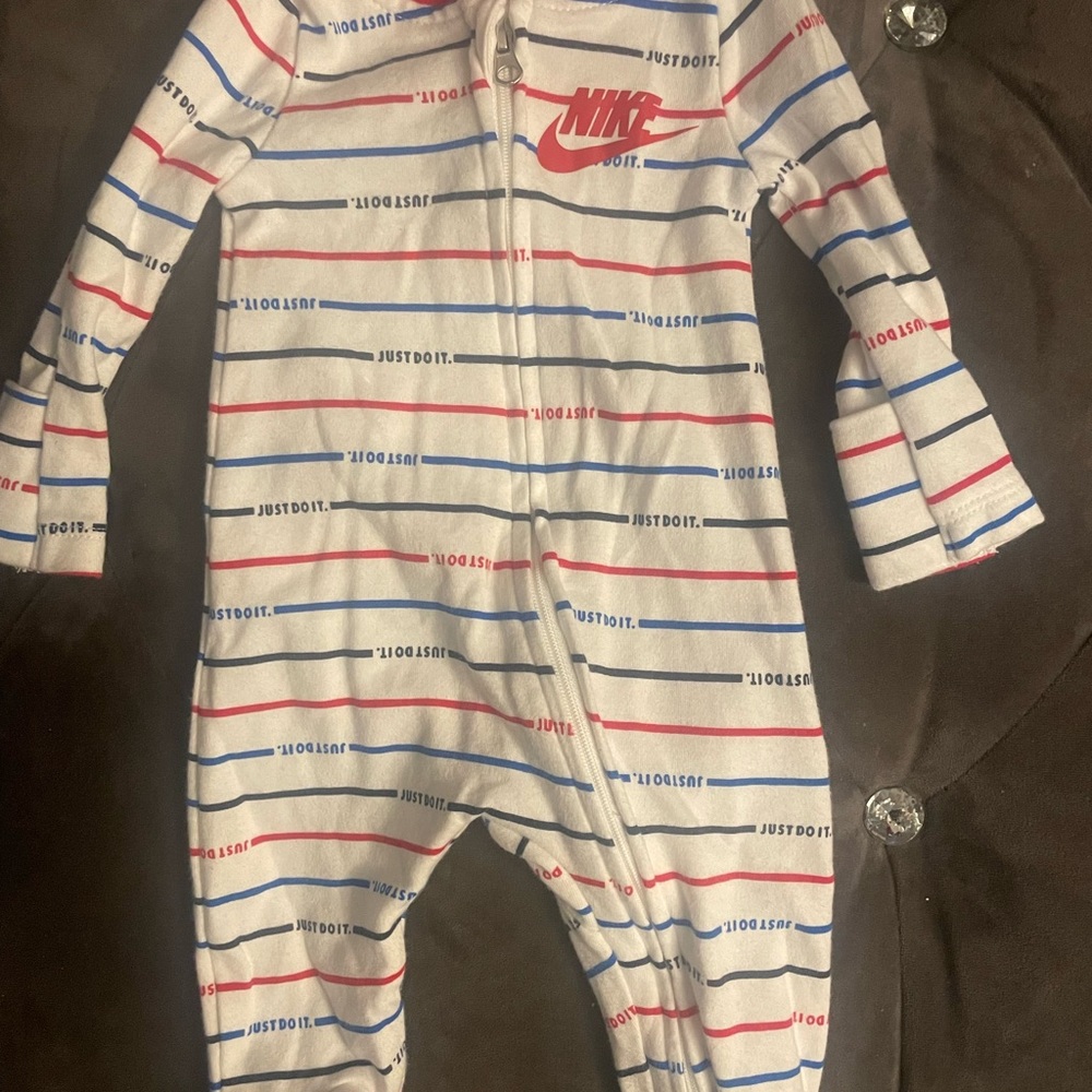 Nike footie one piece